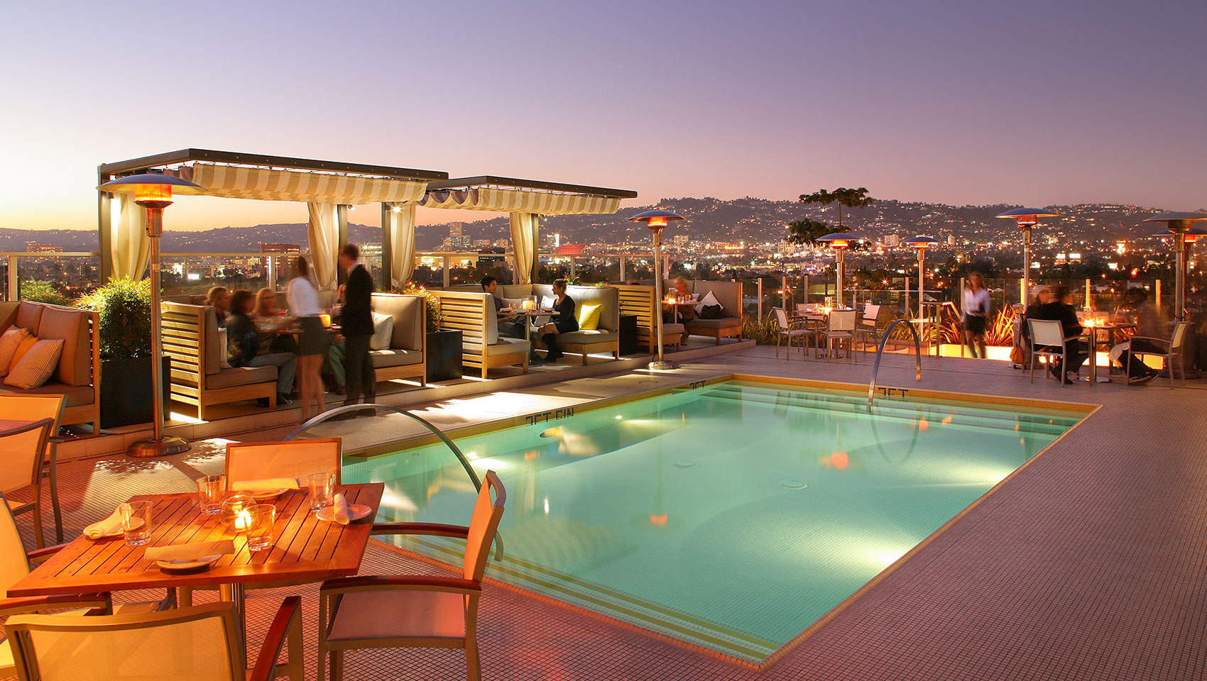 rooftop pool with guests for an event